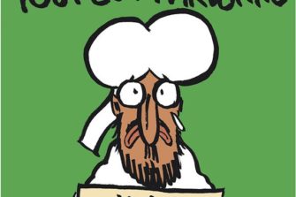 Charlie Hebdon kannessa Muhammad pitää Je suis Charlie -kylttiä