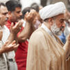 men_praying_holding_hands_up_muslims_photo_IMB